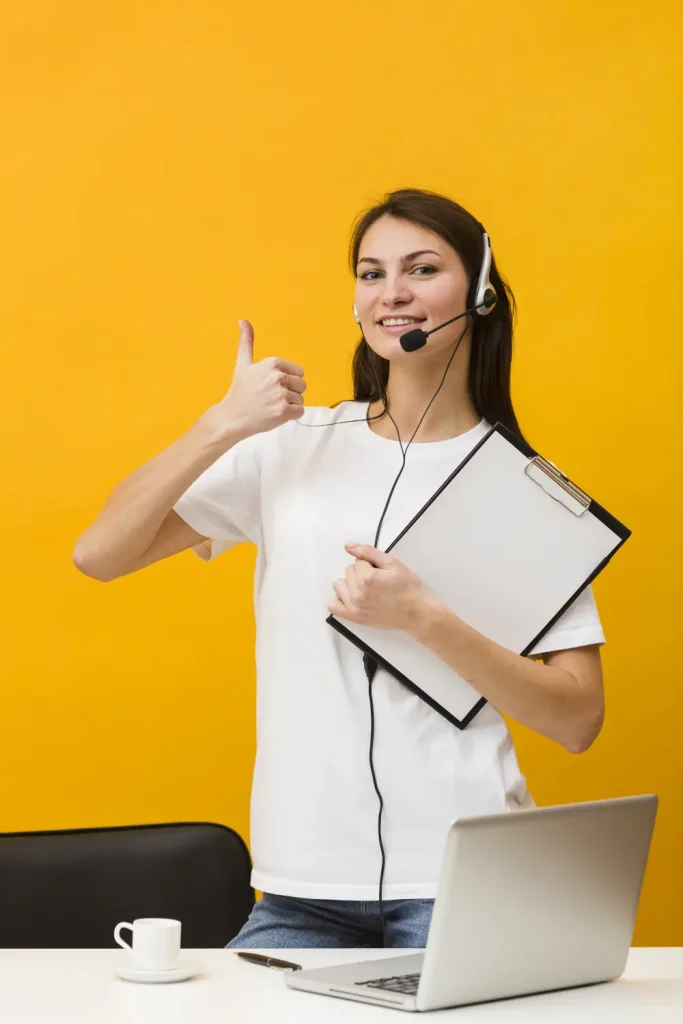 HVAC jobs in Palm Coast - Front view happy woman wearing headset giving thumbs up